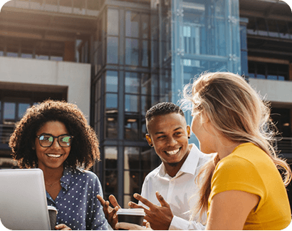 two girls and one boy chatting